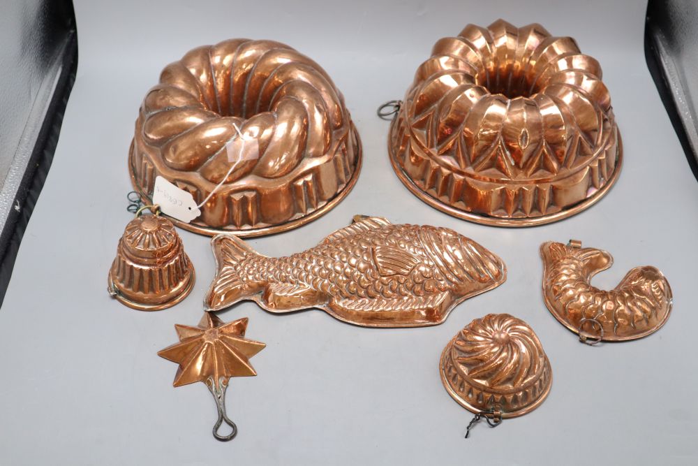 Seven 19th century copper jelly moulds